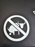 White No Bullshit prohibition-symbol vinyl decal displayed on black board